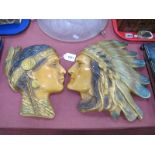 A Pair or Parcware Plaster Red Indian Wall Plaques.