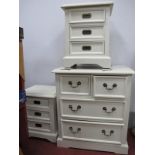 A White Chest of Two Short and Two Long Drawers; together with a pair of bedside chests. (3)