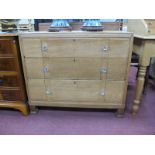 A 1920's Light Oak Chest of Three Drawers, with clear glass handles and with chalk inscription under