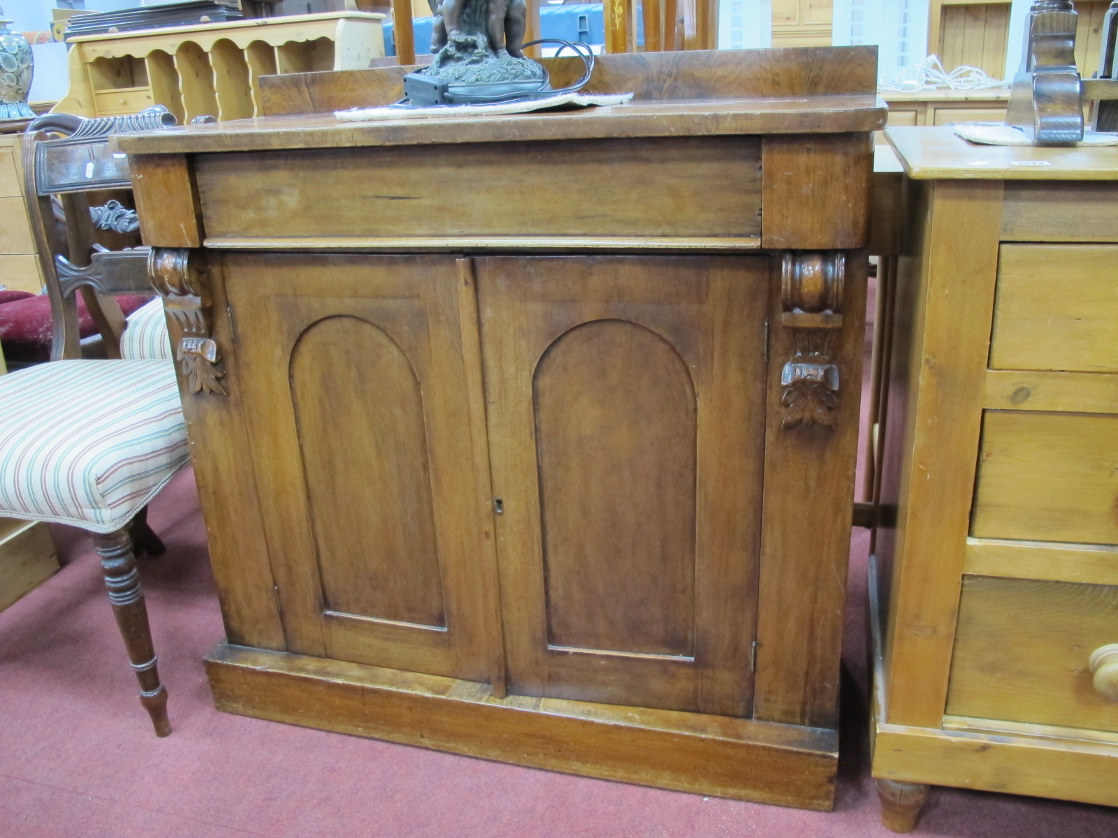 A XIX Century Mahogany Cabinet, with low back, single drawer, twin cupboard doors on plinth base,