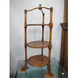 Three Tier Cake Stand, with circular trays, tripod top on splayed legs, 67cm high.