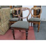 A Set of Six XIX Century Mahogany Balloon Back Dining Chairs, with serpentine fronts on turned legs,