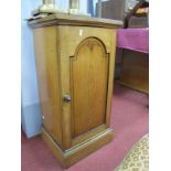 A XIX Century Pot Cupboard, possibly ash with arched panelled door, on plinth base 38.5cm wide.