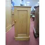 A XIX Century Pine Pot Cupboard, with turned handle on stepped plinth base, having curved corners,