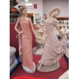 Nao Figurines of Elegant Ladies, each on oval base, 29.5cm high. (2)
