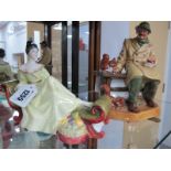 Royal Doulton Figurines 'Lunchtime' HN2485 and 'At Ease' HN2473. (2)