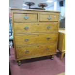 A XIX Century Straight Fronted Flame Mahogany Chest, of two short, three long drawers, on turned