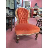 A XIX Century Mahogany Framed Spoon Back Ladies Nursing Chair, with serpentine front, turned legs,