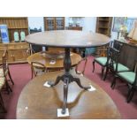 A XIX Century Mahogany Circular Topped Pedestal Table, on turned support, tripod legs and pad
