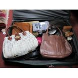 Ladies Handbags, belts etc. in a suitcase.