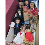 A Pair of Red Indian Dolls, 32cm high, four others. (6)