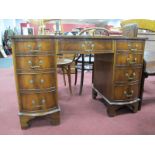 Mahogany Ladies Desk, with serpentine front, scriver inset to top, banks of four drawers to twin