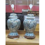 Pair of Chinese Pottery Table Lamps, gilt and floral decoration, on wooden stands.