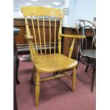 A Farmhouse Kitchen Chair, with spindle back shaped arms and ring turned legs.