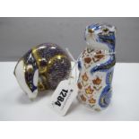 A Royal Crown Derby Paperweight, modelled as a Badger, no stopper (second quality) and another as