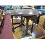 Oak Drop Leaf Coffee Table, on turned and block supports.