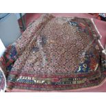 Persian Sharbar Wool Carpet, with allover geometric motifs, birds to corners, on peach ground, 304 x