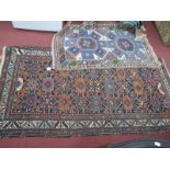 A Middle Eastern Wool Rug, with many geometric motifs to centre panel within tree and staircase