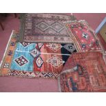 A Middle Eastern Wool Rug, with two octagonal motifs 93 x 84cm, three others. (4)