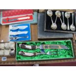 A Baron Stainless Steel and Stag Two Piece Carving Set, other cased cutlery, napkin rings.