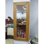 A Large Bevelled Glass Hall Mirror, with oak surround.