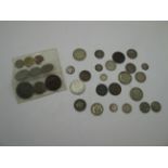 An Interesting Assortment of Coins, to include Queen Victoria shilling 1887, East Africa shilling