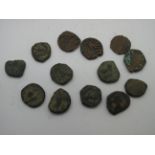 Thirteen Coins, believed to be Ancient Eastern Coins from the Kushan Empire.