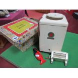 A Mid XX Century Tinplate Washing Machine by Chad Valley, boxed. Plus a small toy vacuum cleaner.
