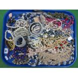 A Selection of Costume Bead Necklaces, bracelets, and bangles, etc:- One Tray