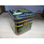 Two Early XX Century Tins, A Lyons Custard Powder and a Huntley and Palmers sample tin.