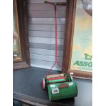 A Mid XX Century Large Scale Toy Lawnmower, by Codeg.