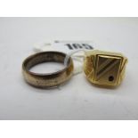 A Middle Eastern Style Gent's Ring, the high rectangular panel with inset highlight, (finger size O)