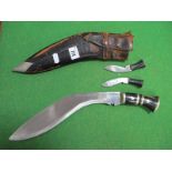 A Mid XX Century Kukri, horn handle with skinning knives in sheath.