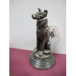 A Cast Metal Figure of a Sitting 'Collie' Style Dog, tip of ear broken in the style of a car