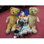 Two Mid XX Century Jointed Teddy Bears, and a doll, one Teddy with music box, well loved.