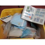 A Large Carton of World Stamps and Covers, in presentation packs and in stockbooks plus world