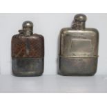 A Hallmarked Silver Hip Flask, Sheffield 1922, with hinged top and removable base cup, together with