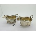 A Pair of Hallmarked Silver Sauce Boats, CB&S, Sheffield 1922, each of plain form with flying scroll