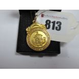 Medal - Huddersfield Town, 1909 Huddersfield & District Football Association Medal, in 9ct gold,