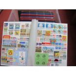 Cinderella Stamps for All Periods, in twelve and one Small stockbooks, a huge quantity of publicity,