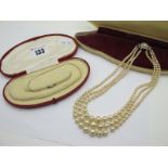 A Single Strand Seed Pearl Bead Necklace, graduated, to plain clasp stamped "9ct", overall length