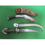 A XX Century Middle Eastern Jambiya, with white metal mounts and wooden handle, plus a 'Tourist'