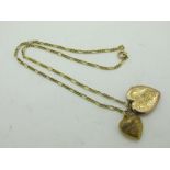 A Figaro Link Chain, stamped "15" (7 grams), a heart stamped locket pendant, of foliate design,