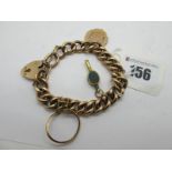 A Hollow Curb Link Bracelet, stamped "9c", to heart shape padlock clasp stamped "9ct", suspending