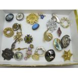 A Small Selection of Costume Brooches, including; "Miracle Creation", floral,modern Celtic, a "