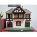 A Mid XX Century Dolls House by Tri-ang, single opening front, mock Tudor design, 48cm wide, 41cm