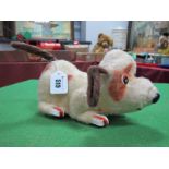 A 1960's/1970's Battery Operated Japanese Toy Dog, with moving tail and ears.