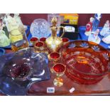 A Venetian Ruby Glass Decanter and Glasses, heavily decorated in gilt and applied with flowers, a