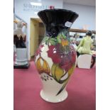 A Moorcroft Pottery Vase, painted in the 'Anna Lily' design by Nicola Slaney, shape 226/9, impressed