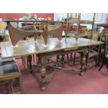 Oak Draw Leaf Dining Table, circa 1920's, on heavy cup and cover supports united by wavy 'X'